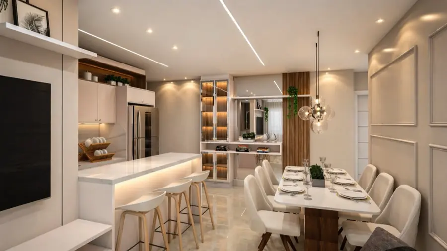 Cozinha branca com ilha em mármore, cristaleira de madeira com iluminação interna e mesa de jantar para oito lugares.